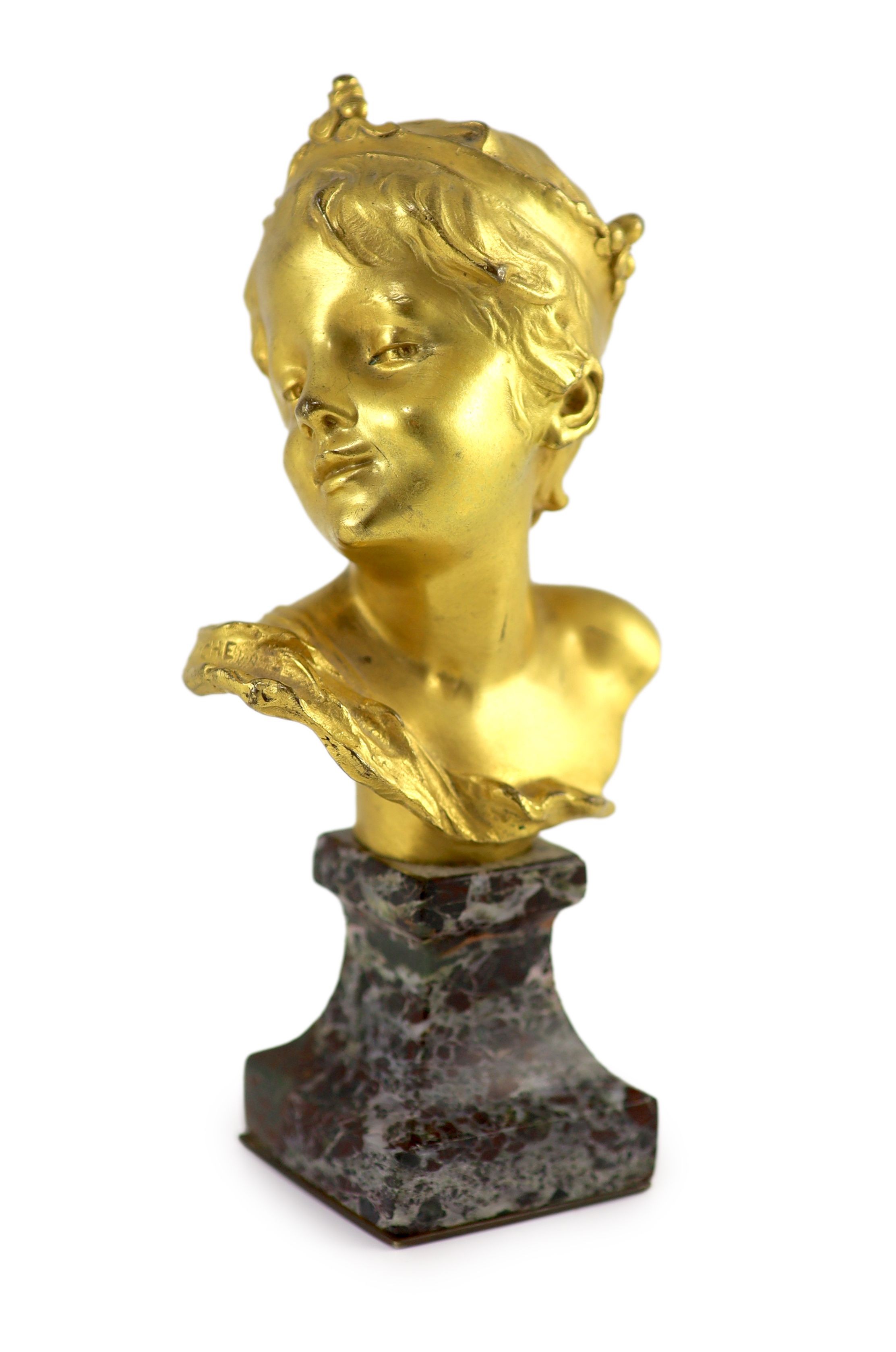 Raoul Francois Larche (1860 - 1912). An ormolu head of a boy king, 16.5cm high overall